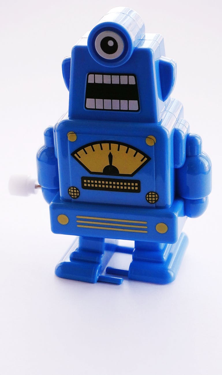 blue and yellow robot toy
